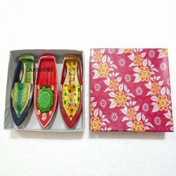 Fish painted boats from varanasi for children